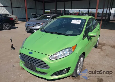 2014 Ford Fiesta Titanium из США, поврежденный, VIN 3FADP4CJ6EM212162